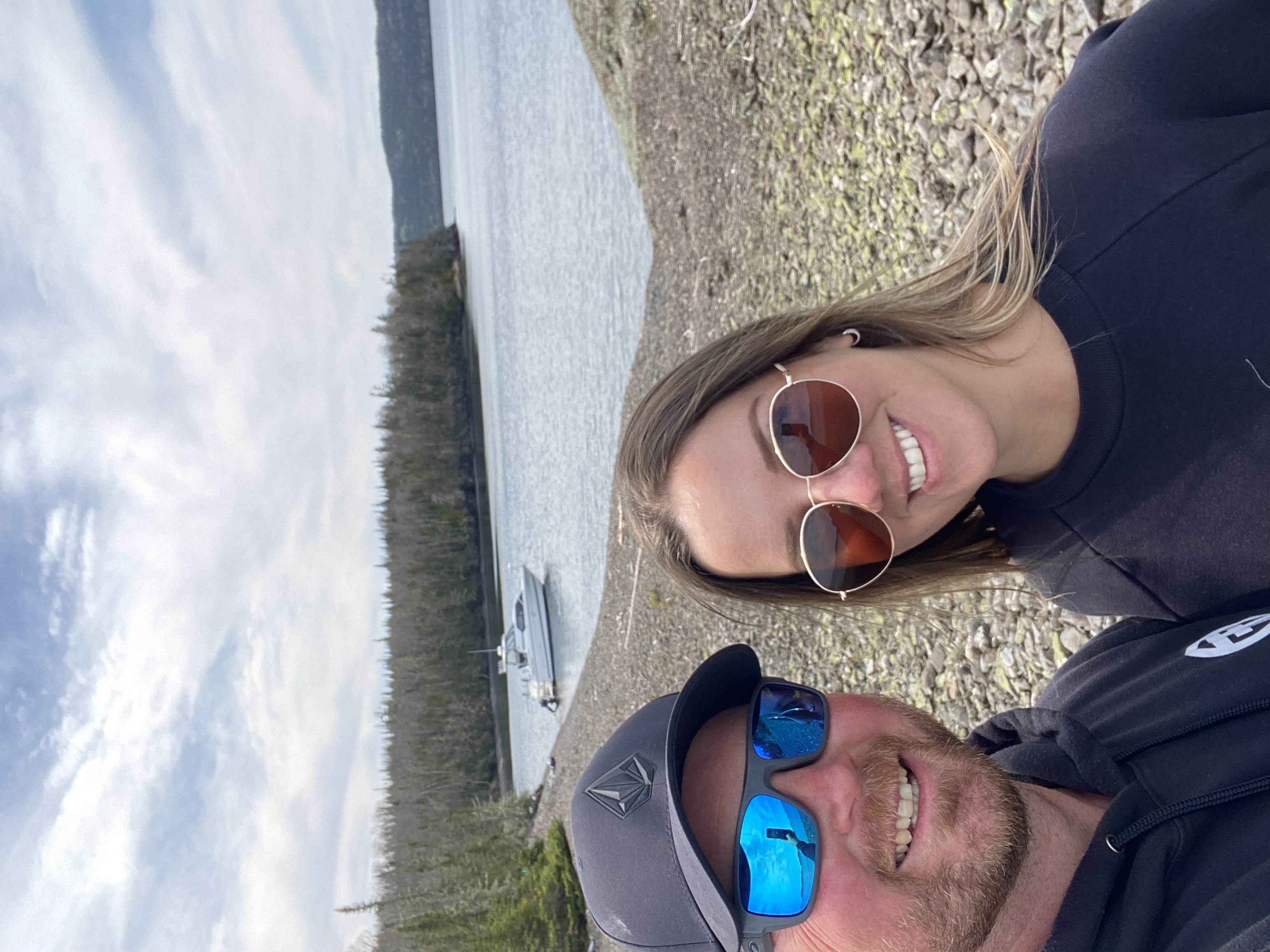 Maddie and Brandon on the shores of Lake Superior